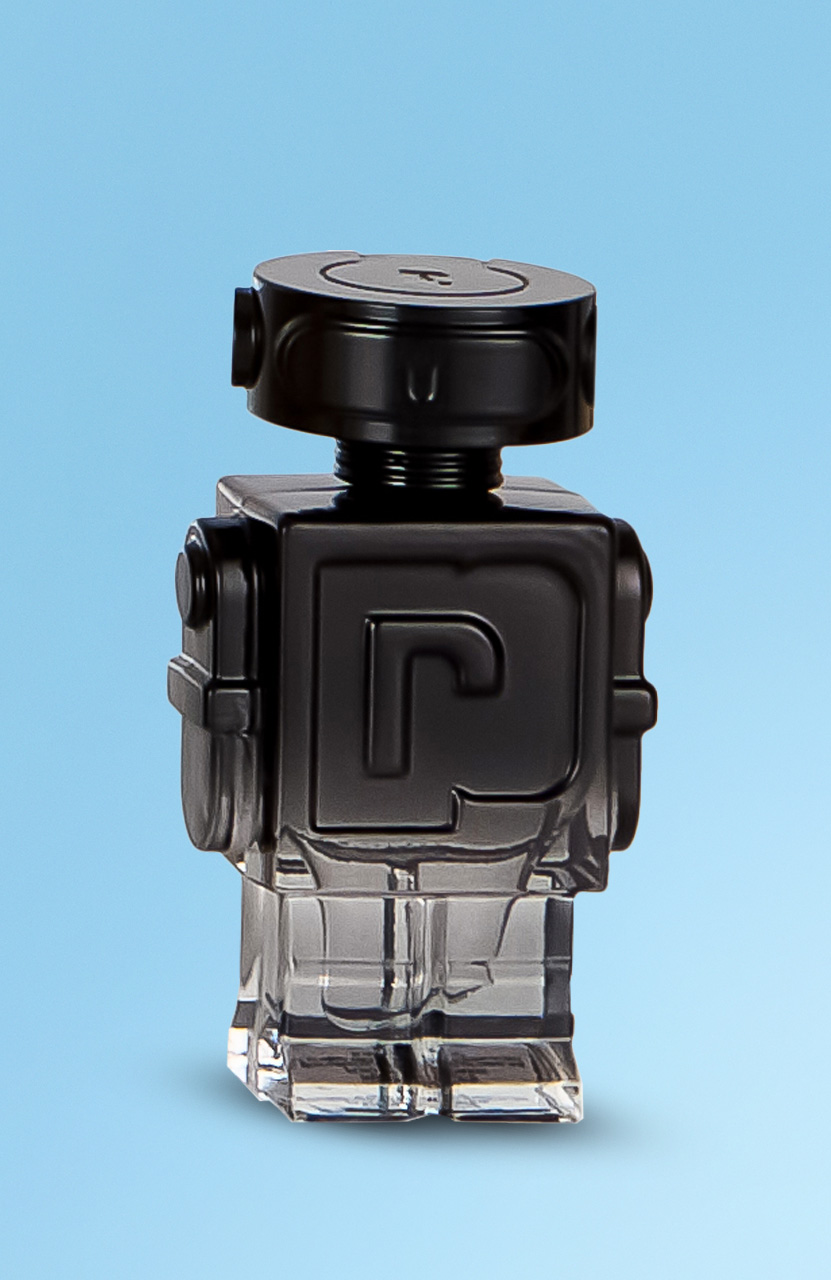 A robot-shaped bottle with a black top, designed by Paco Rabanne.